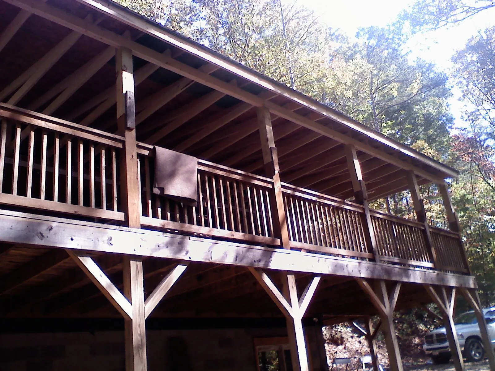 Timber framing under a new elevated porch and deck — Roof Leak Repair in Oelwein by Roofing Brothers